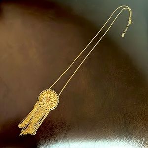 Gold long statement necklace